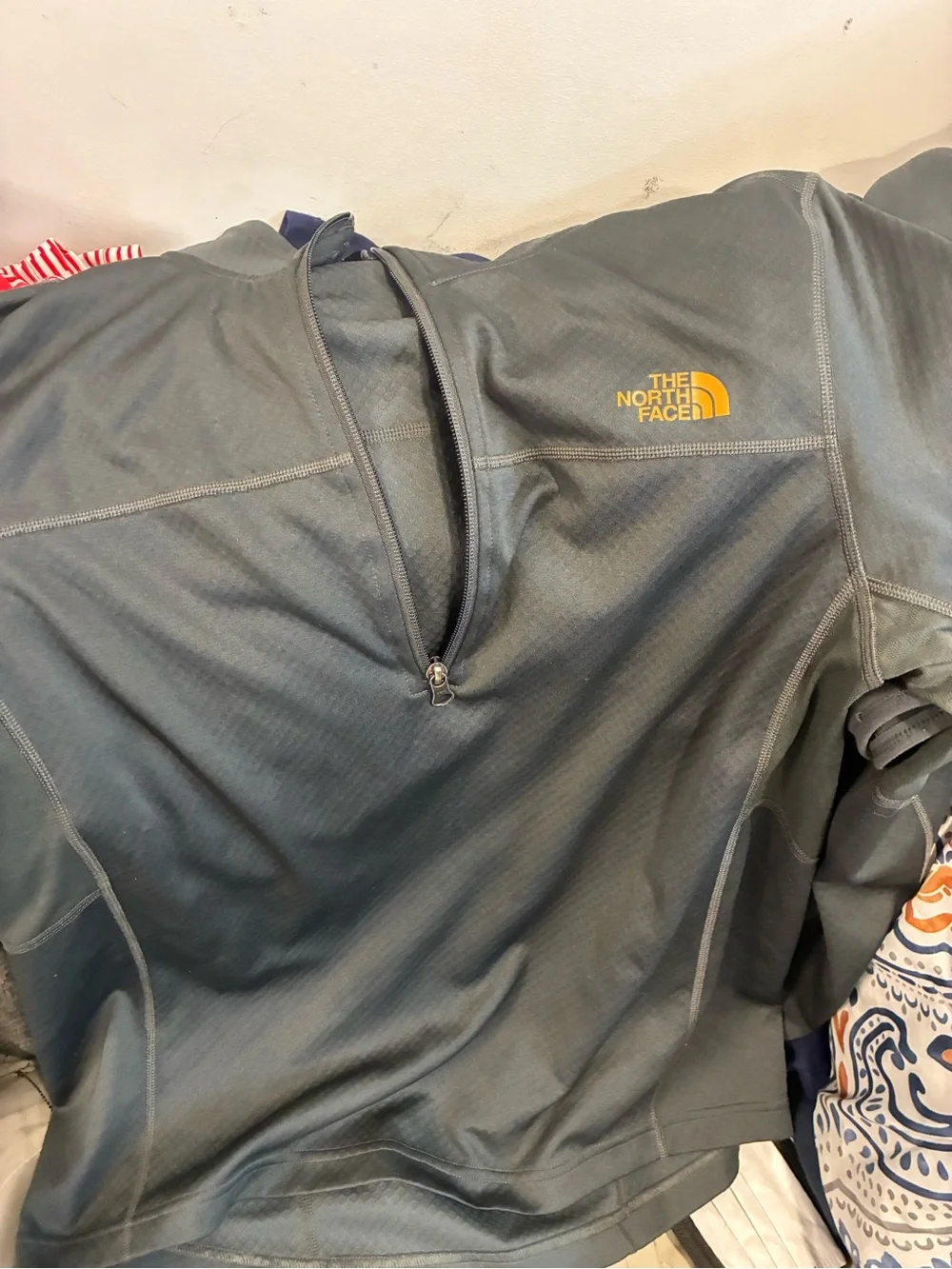 The North Face Men's Dark Green Half-Zip Performance Pullover with Yellow Logo